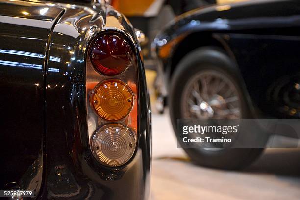 rear lamp of aston martin at the classic car show - auto auction stock pictures, royalty-free photos & images