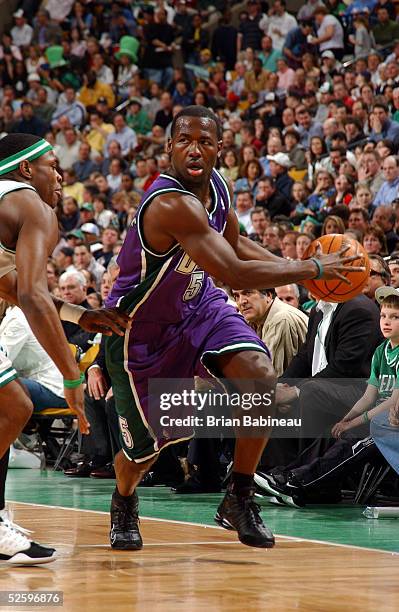 Anthony Goldwire of the Milwaukee Bucks drives against Marcus Banks of the Boston Celtics April 6, 2005 at the Fleet Center in Boston, Massachusetts....