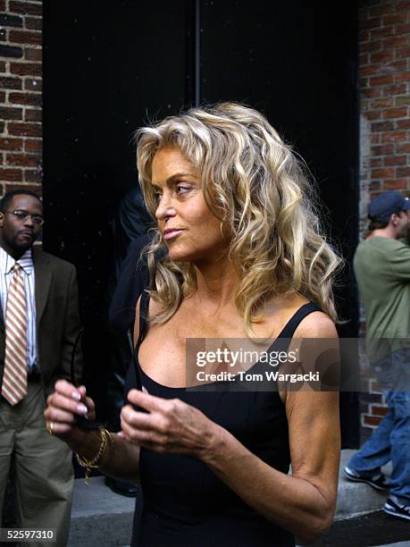 Farah Fawcett pauses outside the Ed Sullivan Theater where she was taping the "Late Show With David Letterman" April 6, 2004 in New York City.