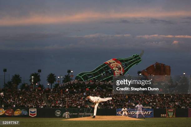 Pitcher Kirk Rueter of the San Francisco Giants throws a pitch against the Los Angeles Dodgers as twilight falls at SBC Park on April 6, 2005 in San...