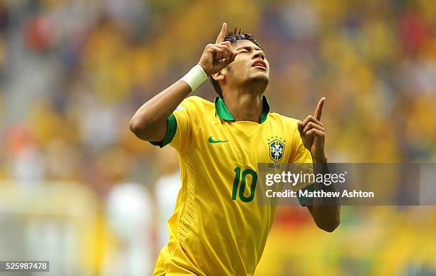 Neymar of Brazil celebrates after scoring a goal to make it 1-0