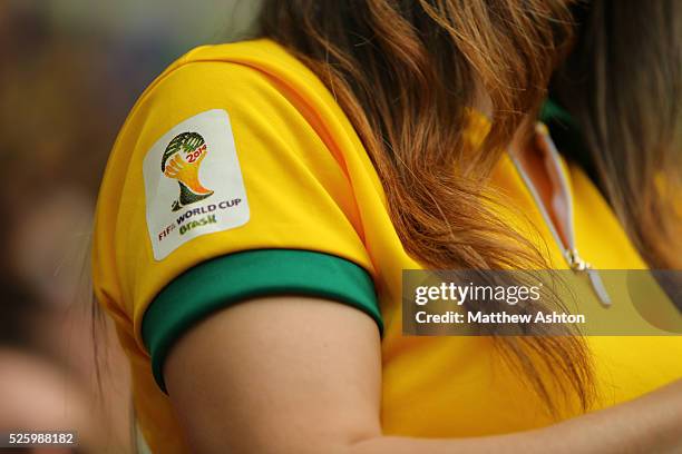 World Cup logo on a yellow Brazil shirt