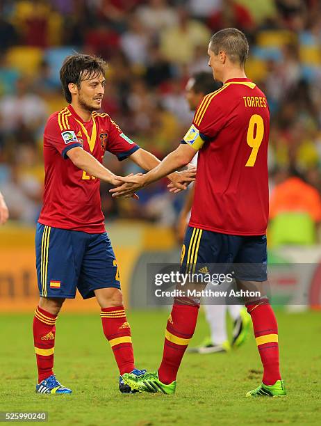 David Silva of Spain celebrates after scoring a goal to make it 10-0