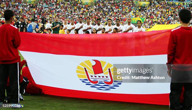 Tahiti Team Group in front of their national flag