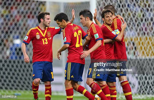 Fernando Torres of Spain celebrates after scoring a goal to make it 6-0