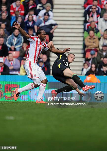 Cameron Jerome of Stoke City and Ryan Bennett of Norwich City