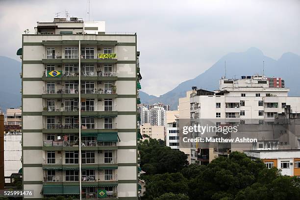 Banner on the top floor of an apartment block overlooking the Estadio Jornalista Mario Filho / Maracana Stadium in Rio de Janeiro, Brazil saying FUCK...
