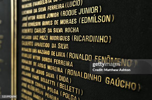 Names of the Brazil squad who won the FIFA World Cup in 2002 on the base of the statue of Hilderaldo Luiz Bellini outside the Estadio Jornalista...