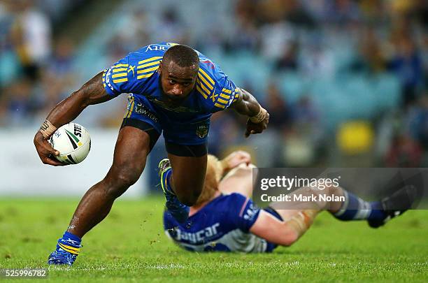 Semi Radradra of the Eels runs over James Graham of the Bulldogs during the round nine NRL match between the Parramatta Eels and the Canterbury...