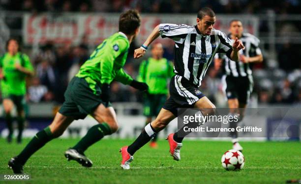 Kieron Dyer of Newcastle battles with the Sporting Lisbon defence during the UEFA Cup Quarter Final First Leg match between Newcastle United and...