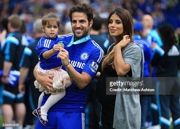 Cesc Fabregas of Chelsea with partner Daniella Semaan as he holds their daughter Lia
