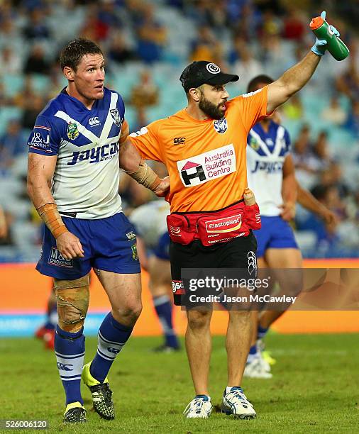 Josh Jackson of the Bulldogs receives attention during the round nine NRL match between the Parramatta Eels and the Canterbury Bulldogs at ANZ...