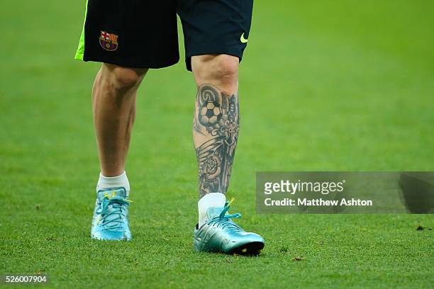 Tattoo on the left leg of Lionel Messi of FC Barcelona