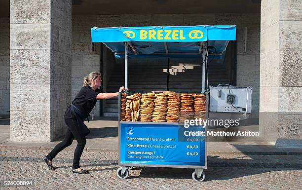 Worker pushes a Brezel trolley outside the Olympic Stadium in Berlin venue for the UEFA Champions League Final 2015 / Olympiastadion