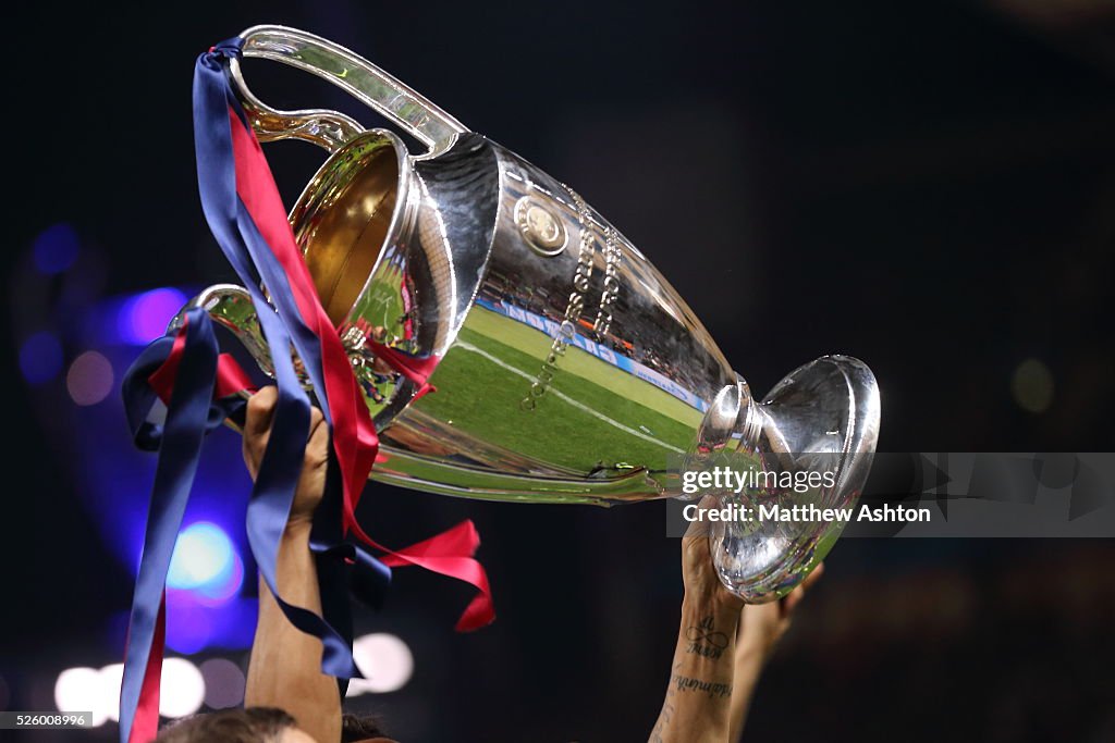 Fifa Ribons The UEFA Champions League Trophy with blue and red ribbons of FC ...