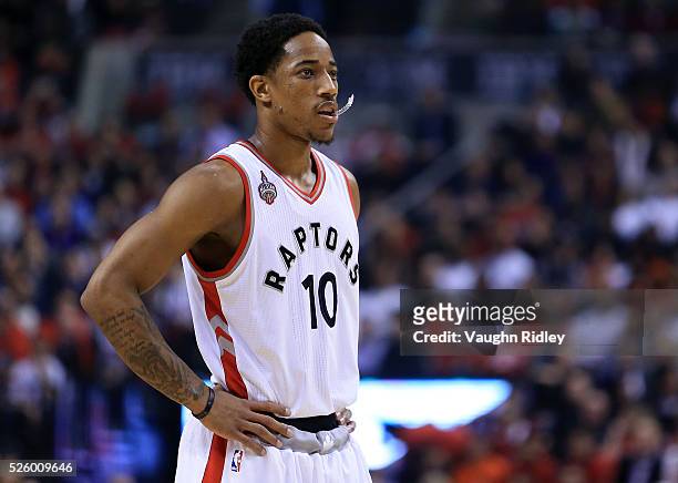 DeMar DeRozan of the Toronto Raptors looks on in the first half of Game Five of the Eastern Conference Quarterfinals against the Indiana Pacers...