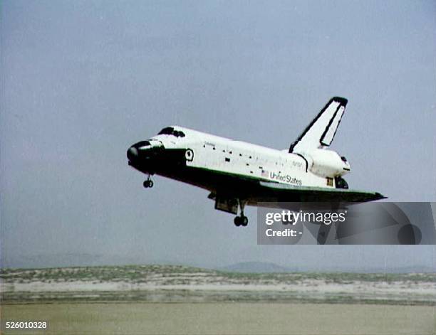 This 14 April 1981 NASA file photo shows the Space Shuttle Columbia landing with mission commander John Young and pilot Robert Crippen on board at...