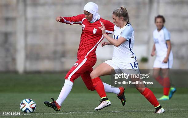 Hajar Dabbaghi vies Brionne Fowle during of Woman's U16 International Tournament match between England and Iran where England beats Iran with 2-0...