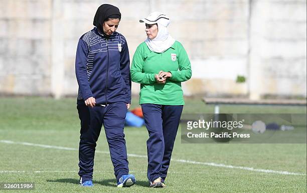 Iran's Head Coach Shadi Mahini speaks with his assistant during of Woman's U16 International Tournament match between England and Iran where England...