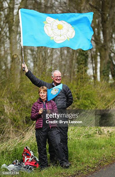 Fans wave the Yorkshire flag during the first stage of the 2016 Tour de Yorkshire from Beverley to Settle on April 29, 2016 in Tadcaster, England.