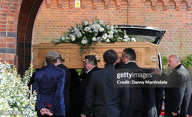 The coffin of David Gest is carried into the church for the funeral of entertainer, producer and reality television star David Gest at Golders Green...
