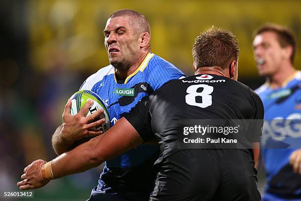 Matt Hodgson of the Force gets tackled by Hanro Liebenberg of the Bulls during the round 10 Super Rugby match between the Force and the Bulls at nib...