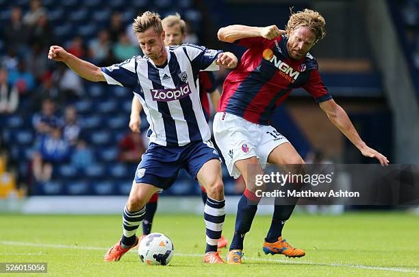 Markus Rosenberg of West Bromwich Albion and Cesare Natali of Bologna