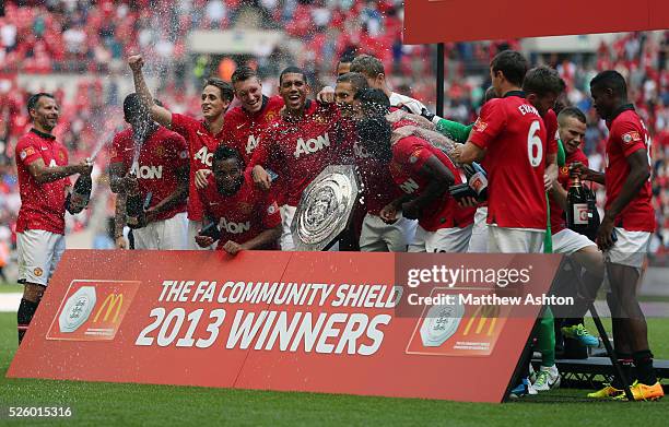 Manchester United celebrate with the Community Shield Trophy