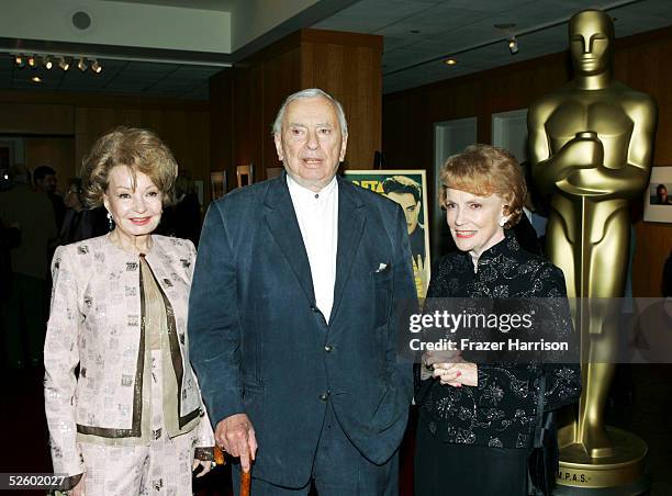 Actress Joan Leslie poses with Gore Vidal author and Cora Sue Collins actress at the Academy of Motion Picture Arts and Sciences Centennial tribute...