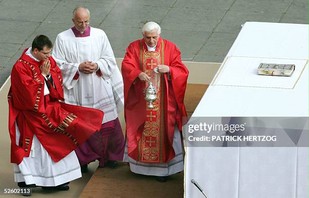 Vatican: German Cardinal Joseph Ratzinger arrives to preside the funeral mass for Pope John Paul II in St Peter's Square at the Vatican City 08 April...