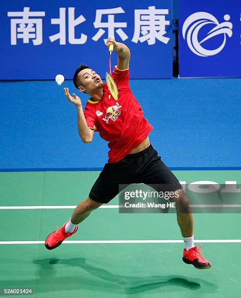 China's Lin Dan returns a shot to Lee Dong Keun of Korea during the 2016 Asia badminton championship on April 29, 2016 in Wuhan, Hubei province,...