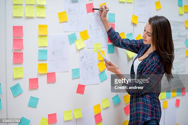creative business woman - post it note pad stock pictures, royalty-free photos & images