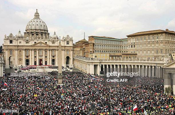 Vatican: General view shows the crowd gathering at St Peter's Square in the Vatican City 08 April 2005 during the mass funeral of Pope John Paul...