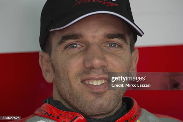 Alex De Angelis of Rep. San Marino and IodaRacing Team smiles in box during the World Superbikes - Practice at Enzo & Dino Ferrari Circuit on April...