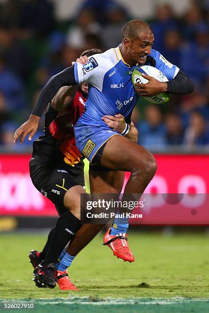 Marcel Brache of the Force gets tackled by Francois Brummer of the Bulls during the round 10 Super Rugby match between the Force and the Bulls at nib...