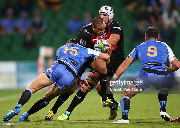 Travis Ismaiel of the Bulls gets tackled by Dane Haylett-Petty of the Force during the round 10 Super Rugby match between the Force and the Bulls at...