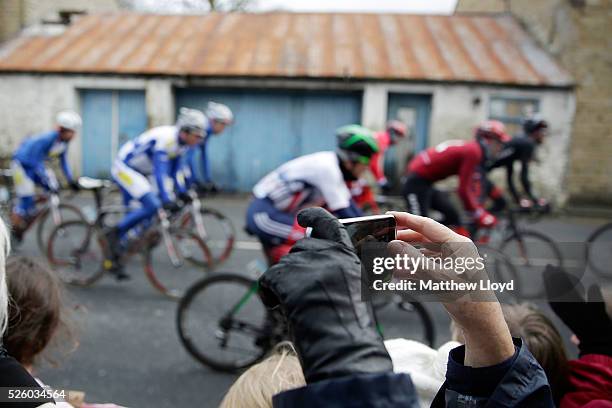 Spectators line the main street of Grassington as the riders of the Tour De Yorkshire cycle race pass on April 29, 2016 in Ripley, England. The first...