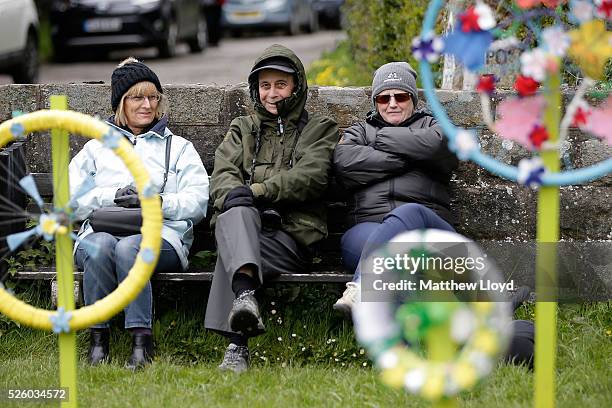 Spectators line the main street of Ripley as the riders of the Tour De Yorkshire cycle race pass on April 29, 2016 in Ripley, England. The first day...