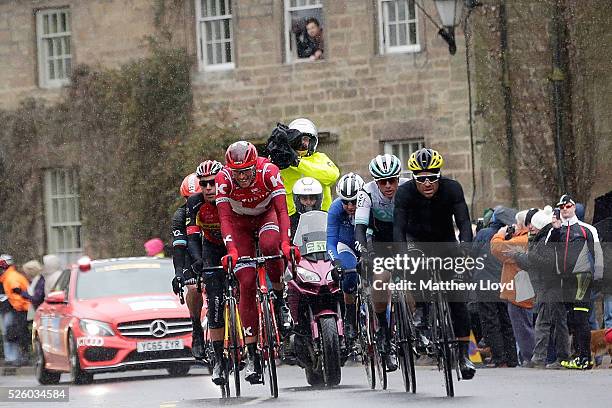 Spectators line the main street of Ripley as the riders of the Tour De Yorkshire cycle race pass on April 29, 2016 in Ripley, England. The first day...