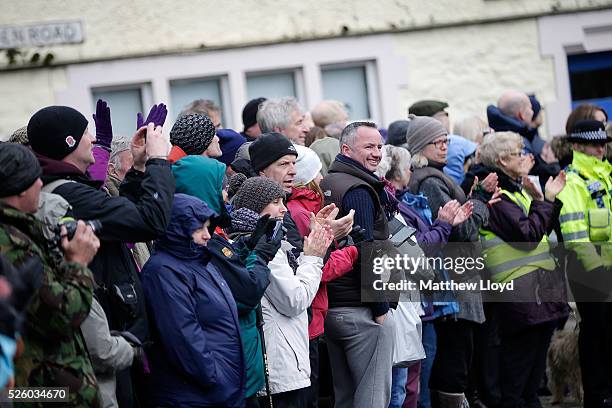 Spectators line the main street of Grassington as the riders of the Tour De Yorkshire cycle race pass on April 29, 2016 in Ripley, England. The first...
