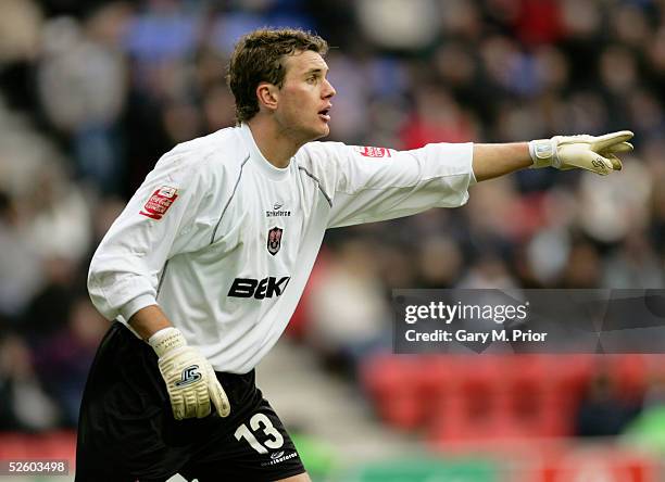 Andy Marshall of Millwall in action during the Coca Cola Championship match between Wigan Athletic and Millwall held at the JJB Stadium, Wigan on...