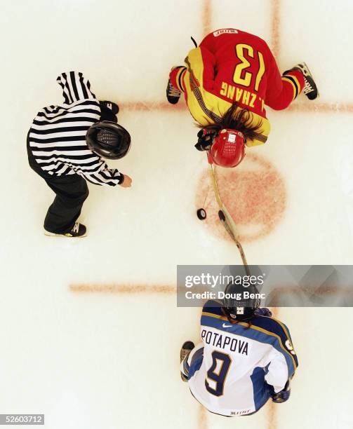 Jing Zhang of team China faces off with Olga Potapova of team Kazakhstan in a IIHF World Women's Championships qualifying game at the...