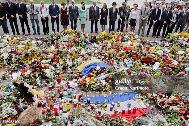 Ambassador of the Kingdom of The Netherlands in Ukraine Kees Klompenhouwer with embassy employees holds a minute of silent for victims of MH-17 air...