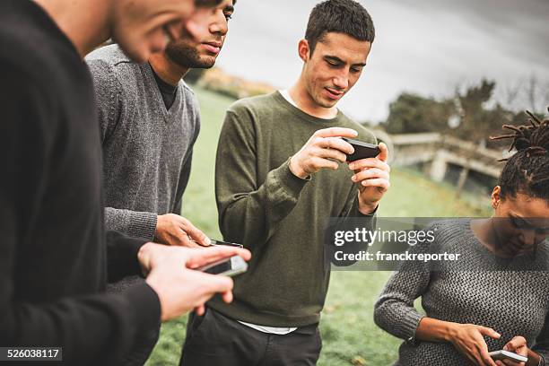 Texted Crowd Of People Talking Texting Photos and Premium High Res Pictures ...