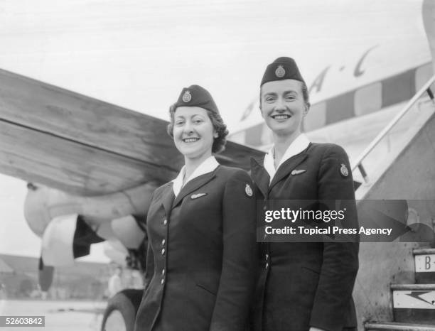 Two BOAC air hostesses, D Barzilay and J M Henderson at London Airport, 23rd January 1956. They are part of the crew of the BOAC Argonaut Atalanta...