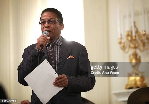 Musician Herbie Hancock speaks to high school students during a History of Jazz Student Workshop at the State Dining Room of the White House April...