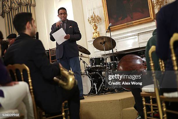 Musician Herbie Hancock speaks to high school students during a History of Jazz Student Workshop at the State Dining Room of the White House April...