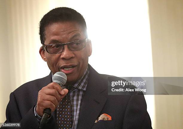 Musician Herbie Hancock speaks to high school students during a History of Jazz Student Workshop at the State Dining Room of the White House April...