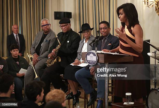 First Lady Michelle Obama speaks to high school students as musicians Herbie Hancock, Dee Dee Bridgewater, Bobby Watson and Terrence Blanchard listen...