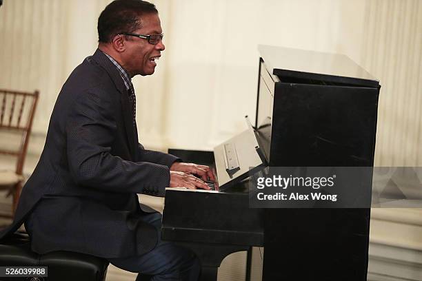 Musician Herbie Hancock performs during a History of Jazz Student Workshop at the State Dining Room of the White House April 29, 2016 in Washington,...